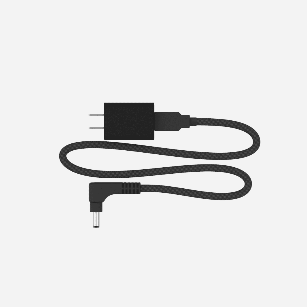 A black power cable with a wall adapter and a right-angle DC barrel plug