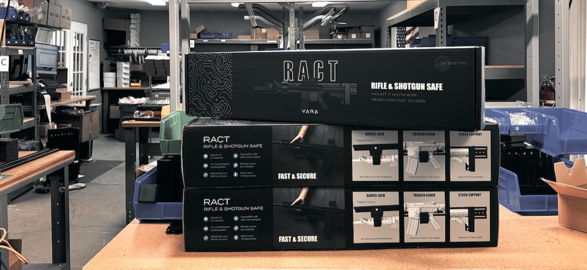 Three boxed RACT safes stacked on a workbench in Vara's assembly area
