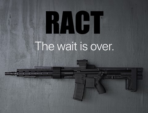 A rifle on grey wood under the words RACT, the wait is over
